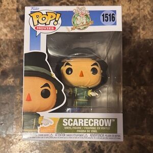 Funko Pop Scarecrow Figure with Green and Orange